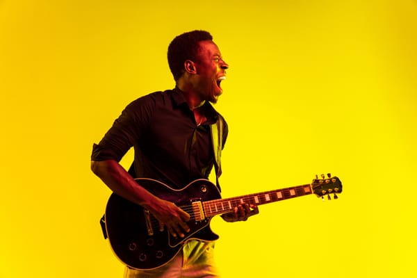 Man playing a guitar